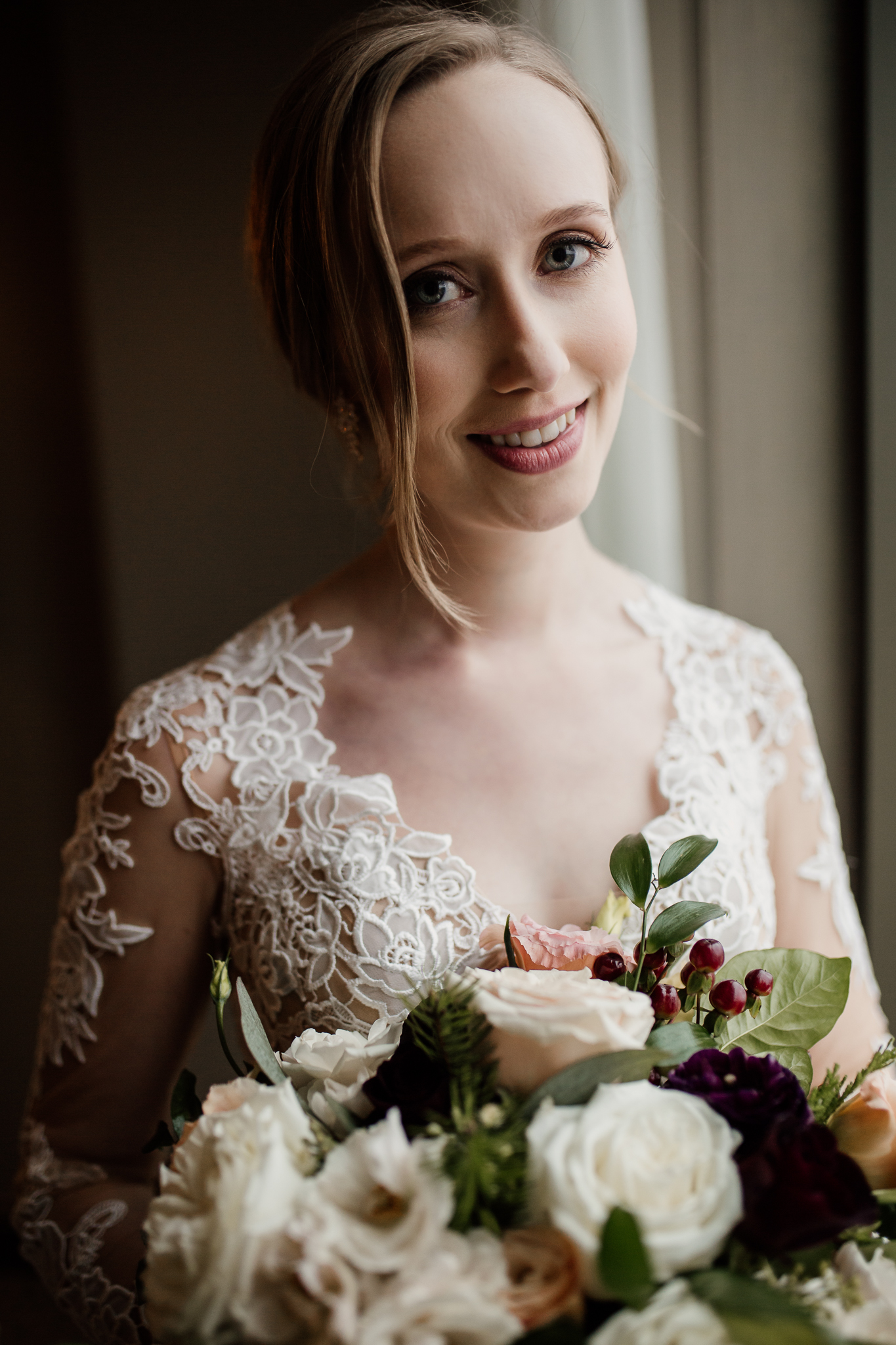 Bride holding a boquet at the Edgewater Hotel Madison, WI.